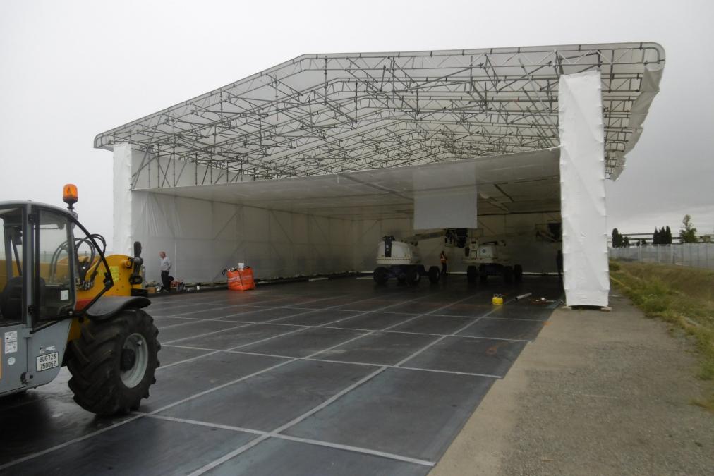 Exemple d’un chantier de désamiantage de portes sectionnelles grandes dimensions floquées intérieurement au Progypsol